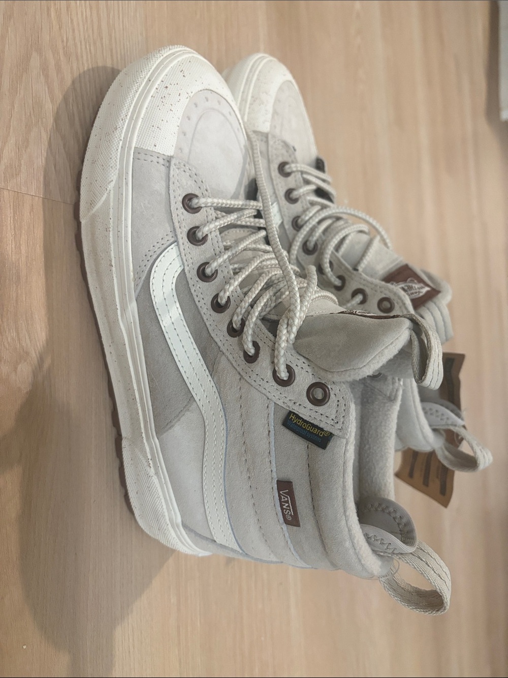 Vans women’s8.5/mens 7 High-Top Suede Sneakers in Light Gray and White